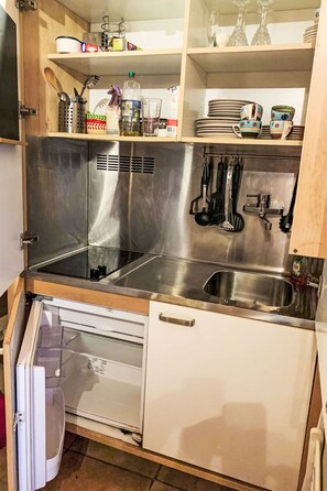 Fridge, microwave, cookware/dishes/utensils