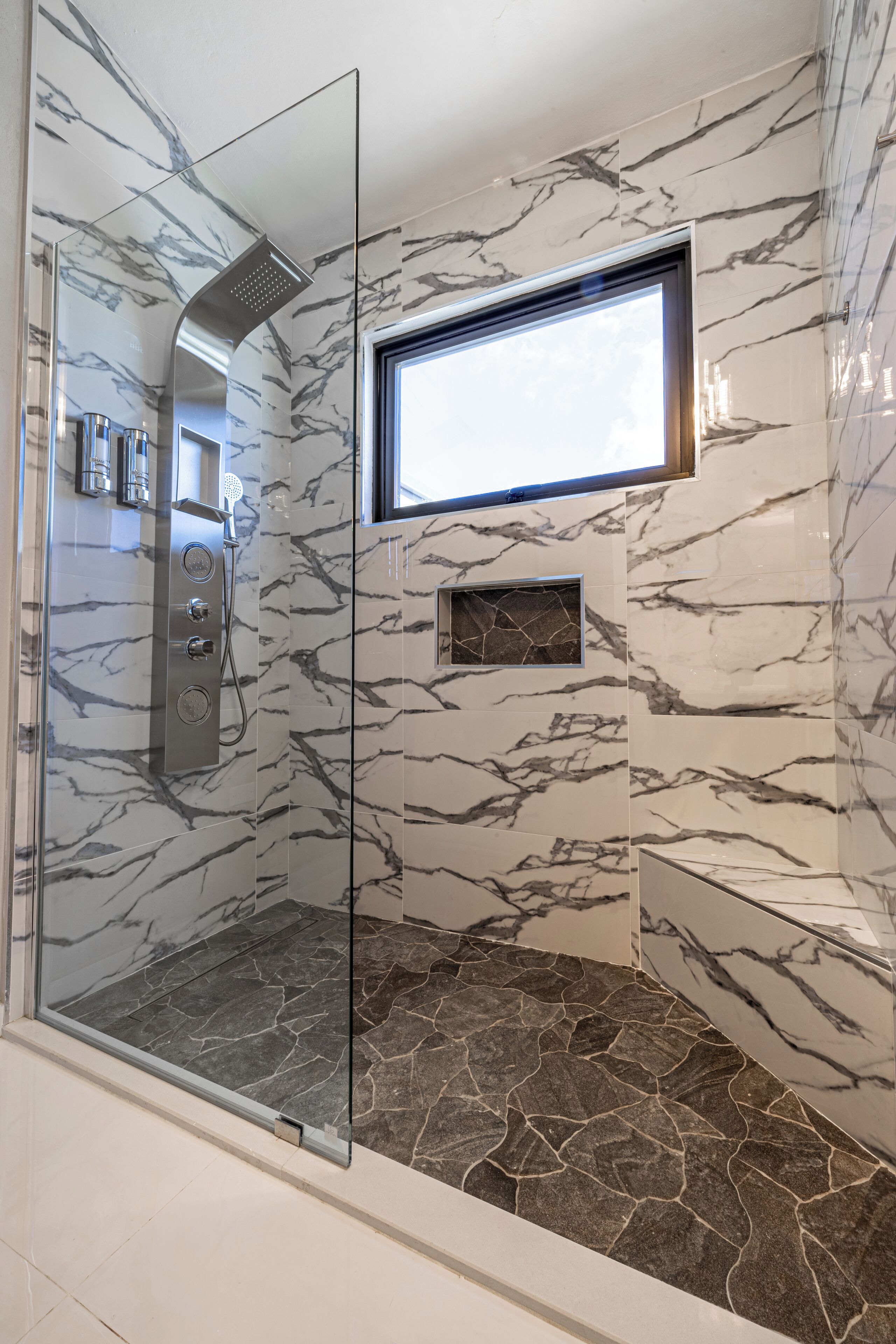 Shower, hair dryer, towels, soap