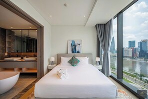Panoramic Apartment, 3 Bedrooms, Balcony, City View | Free minibar items, individually furnished, desk, soundproofing - Metropole Residences Luxury Suite (Ho Chi Minh City)