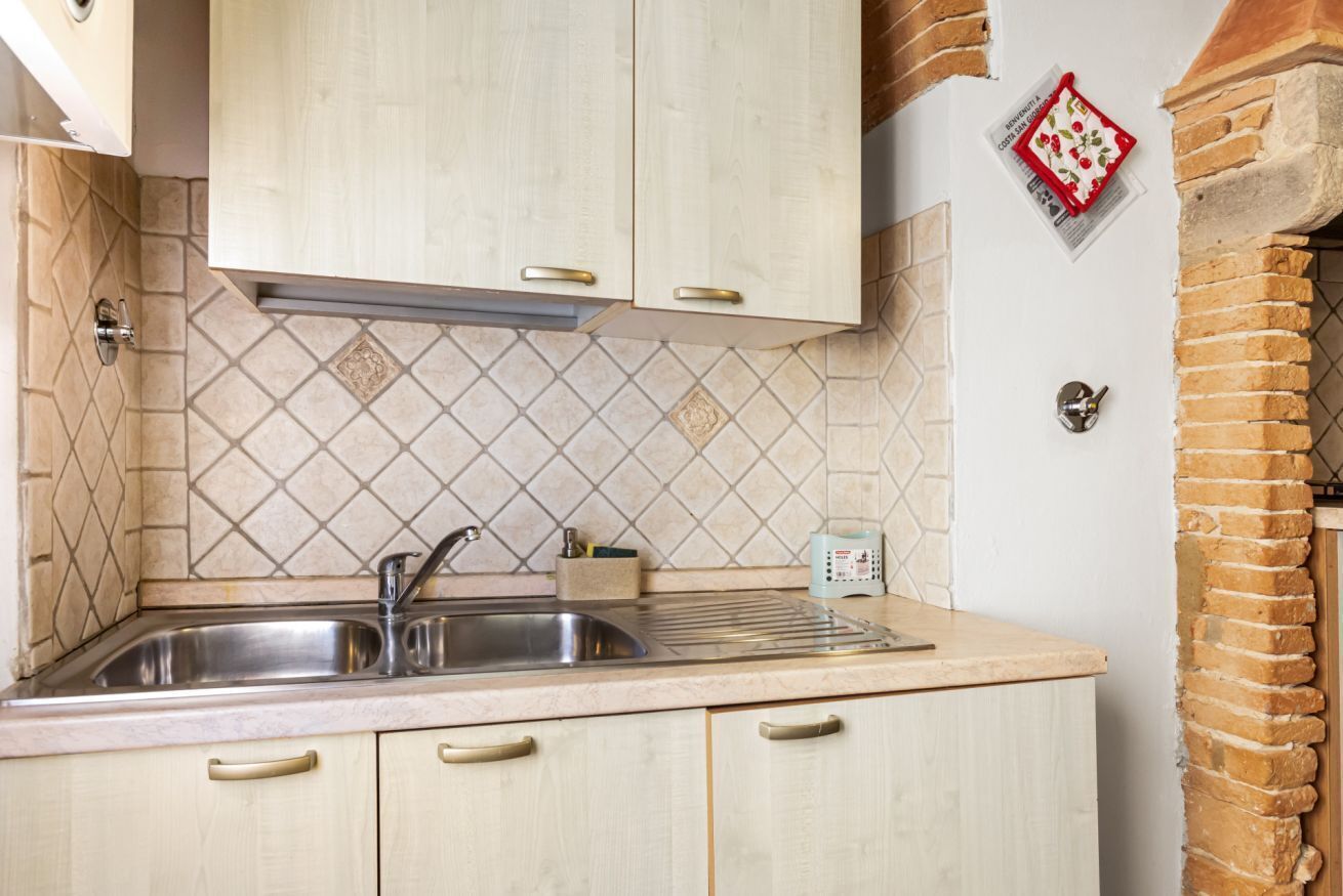 Fridge, microwave, stovetop, cookware/dishes/utensils