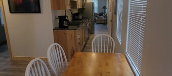 Modern Cozy Woman Lake Woodland Cabin, 24 acres, lakeshore, woodstove, AC, Wi-fi