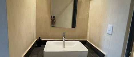 Shower, towels, soap, toilet paper