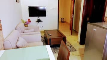 25-inch flat-screen TV with satellite channels, TV