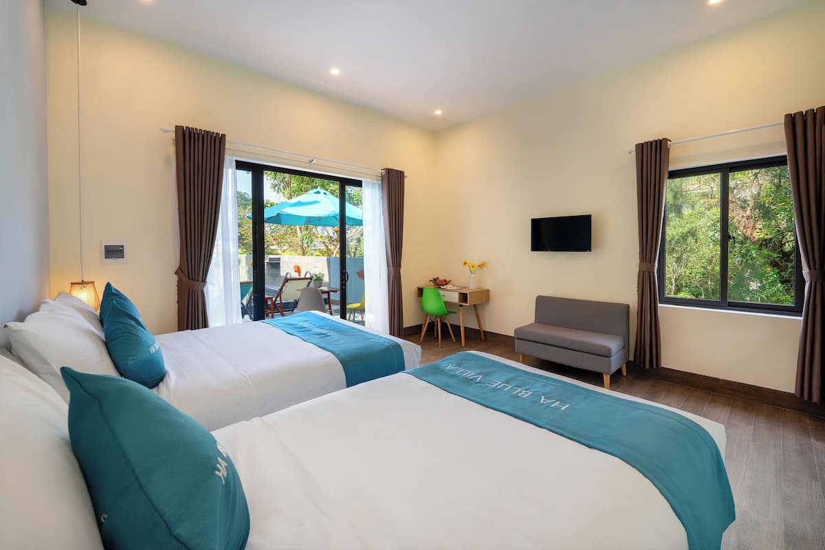Deluxe Double or Twin Room, Pool View | Desk, laptop workspace, soundproofing, free WiFi