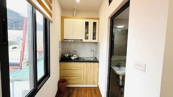 Chambre Confort, vue ville | Cuisine privée