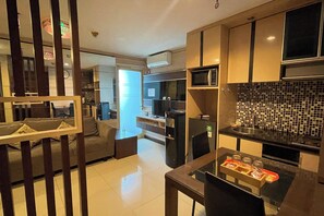 Apartamento standard, 2 quartos | 2 quartos, frigobar, escrivaninha, Wi-Fi de cortesia