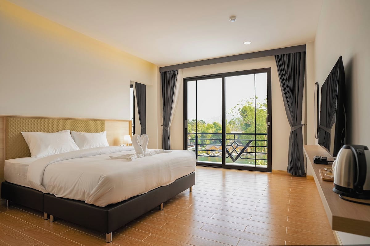 Double Room, River View | Desk, blackout drapes, free WiFi, bed sheets