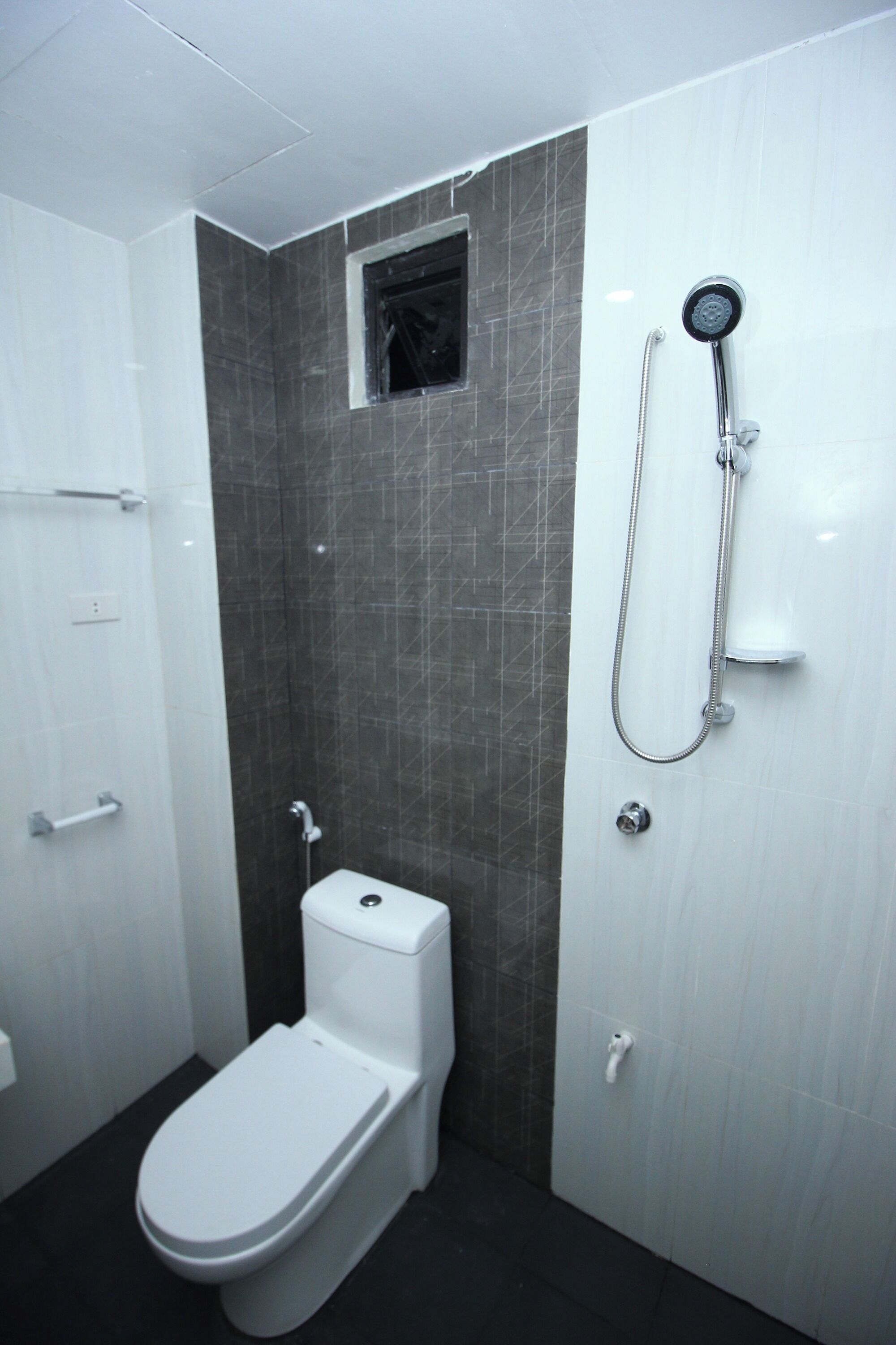 Shower, free toiletries, slippers, towels