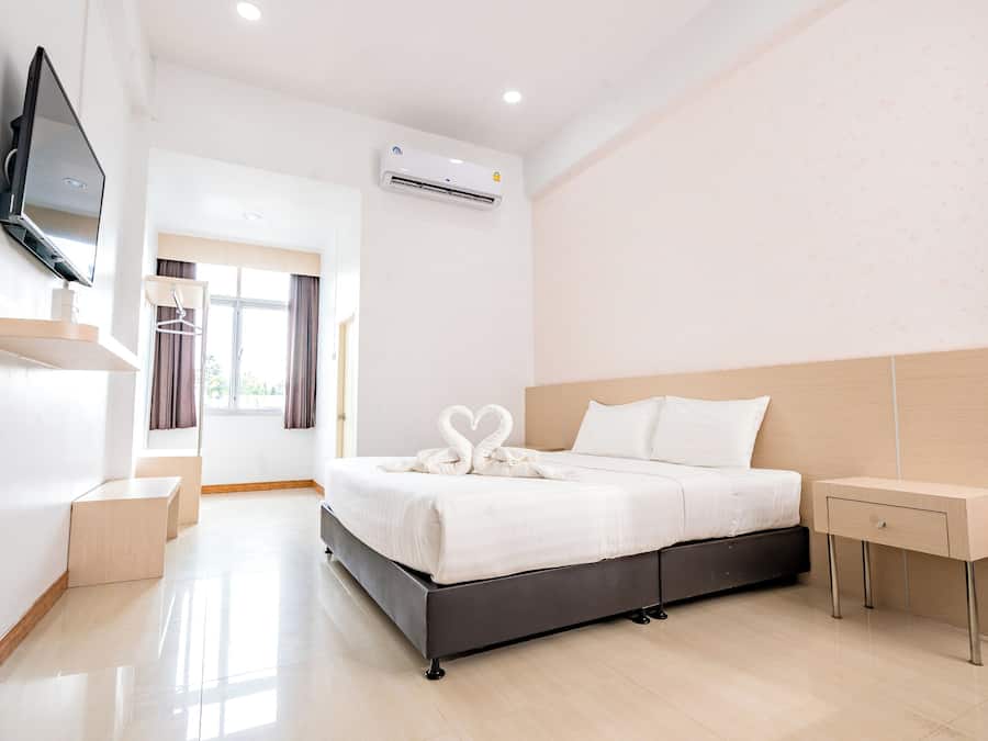 Quarto standard, 1 cama King | Escrivaninha, cortinas blackout, ferros/tábuas de passar roupa