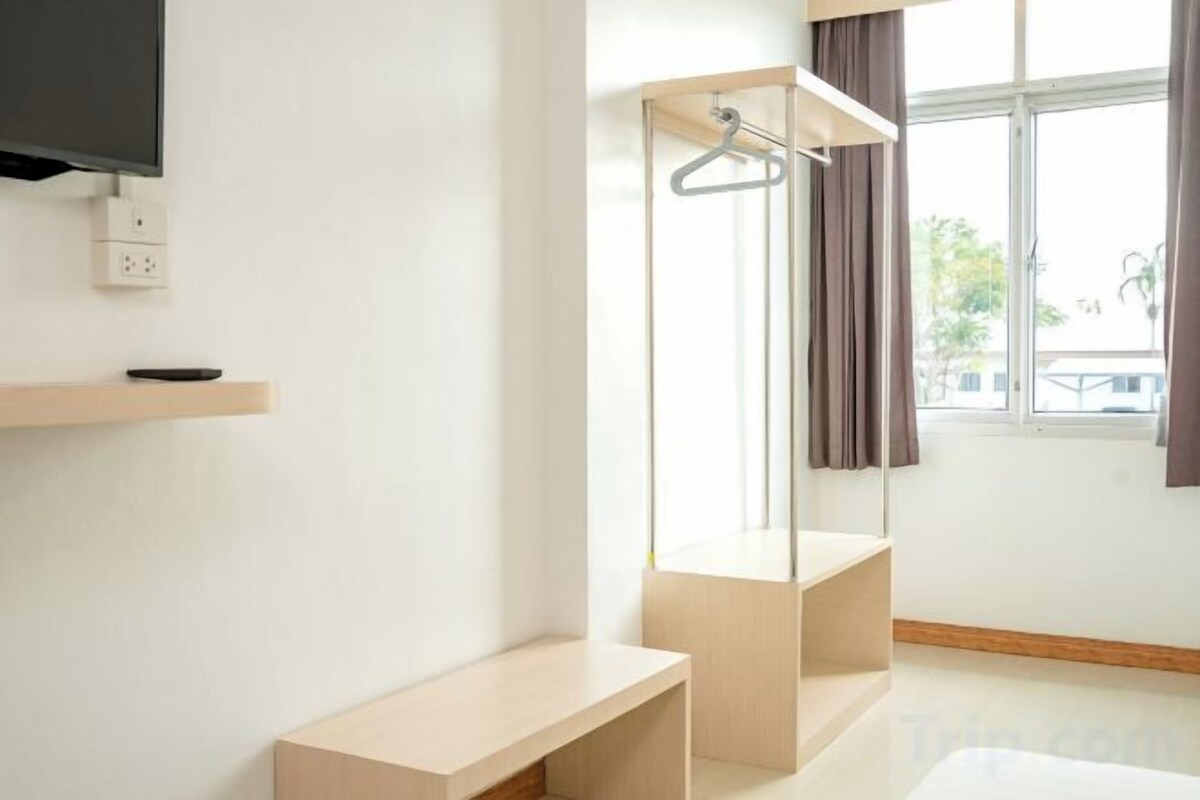 Desk, blackout drapes, iron/ironing board (on request), WiFi (free)