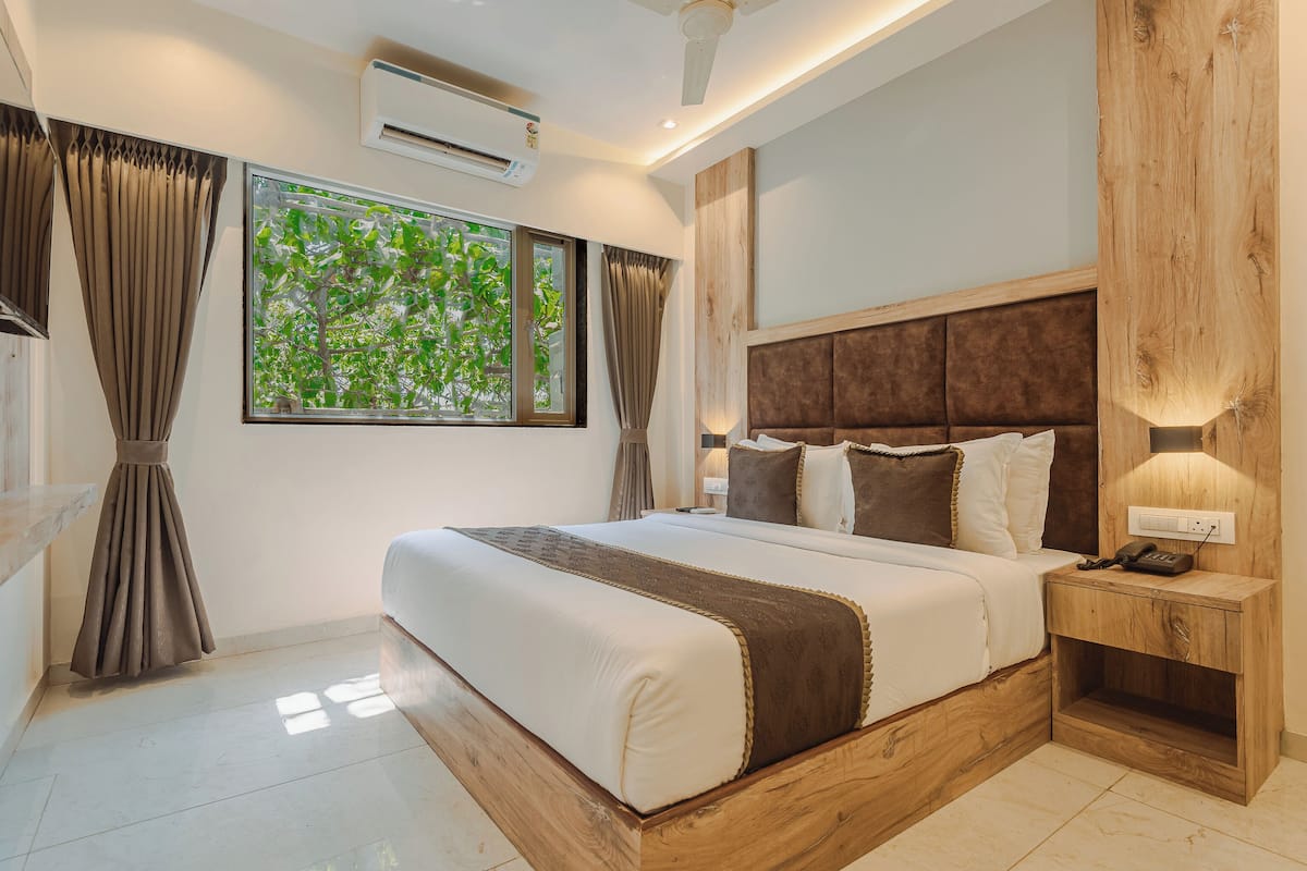 Deluxe Double Room, City View | 1 bedroom, soundproofing, free WiFi