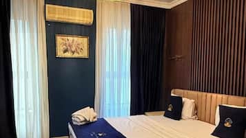 Ropa de cama de alta calidad y minibar