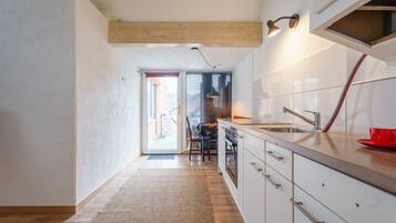 Fridge, stovetop, cookware/dishes/utensils