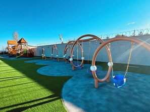 Zona de jocs infantil: a l'aire lliure