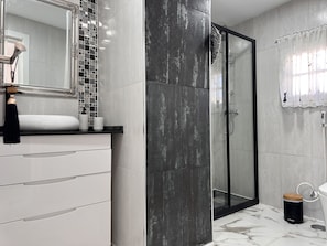Shower, hair dryer, towels, soap