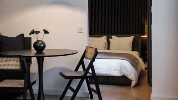Luxury Apartment, Courtyard View | Living area | 42-inch Smart TV with cable channels, Netflix, streaming services