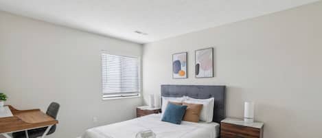 1 bedroom, desk, iron/ironing board, travel crib