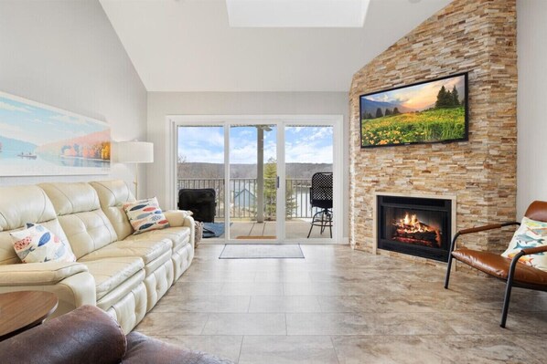 Smart TV, fireplace, books