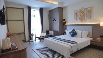 Deluxe Single Room, City View | In-room safe, desk, laptop workspace, blackout curtains