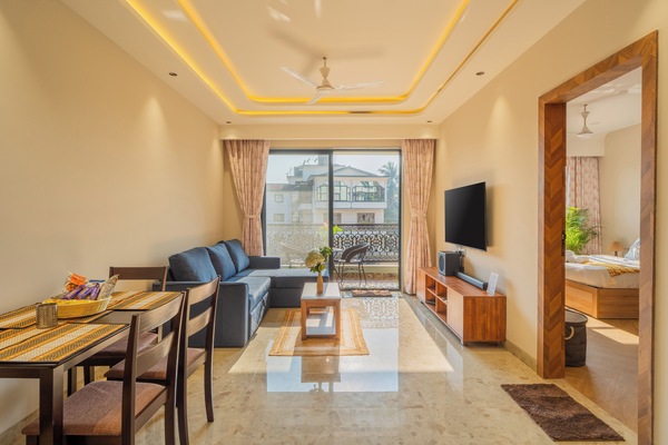 Apartment, 1 King Bed, Balcony, City View | Living area | Flat-screen TV