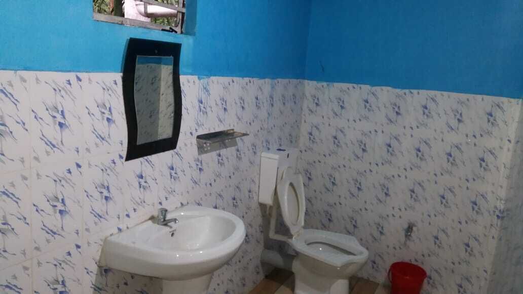 Shower, slippers, towels, soap