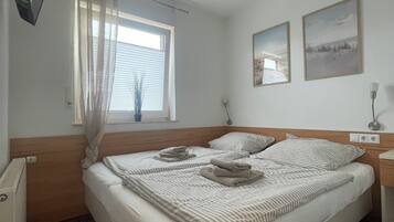 1 chambre, lit parapluie, Wi-Fi gratuit, draps fournis
