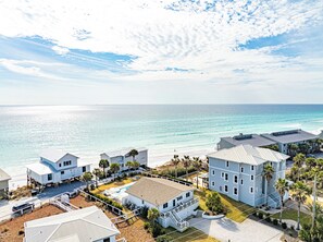 A coastal property with multiple buildings, a swimming pool, and a beach view. - Private Beach Access, Private Pool/Hot Tub, Beach Service, and Pet Friendly! (Santa Rosa Beach)