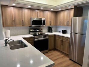 Fridge, microwave, oven, stovetop - Stunning Naples Bay: Pool, Beach, & Resort Access (Naples)