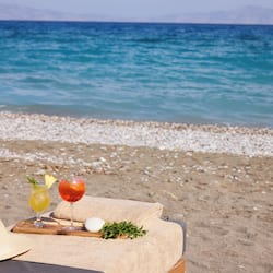 On the beach, sun loungers, beach umbrellas, beach towels