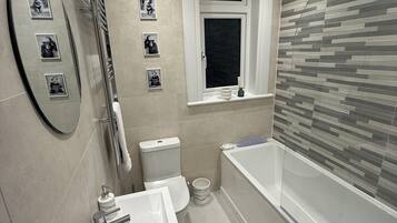 Hair dryer, towels, soap, shampoo