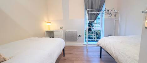 Departamento | 2 habitaciones, tabla de planchar con plancha y wifi gratis