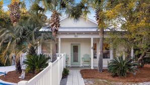 A house with a white exterior, a green door, and a number 180 on the front. - Seagrove Beach - Private Pool - Pet Friendly (Santa Rosa Beach)