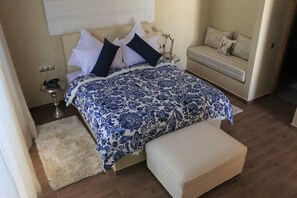 Deluxe Double Room, Pool View | 1 bedroom, in-room safe, laptop workspace, blackout drapes