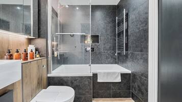 Shower, hair dryer, towels