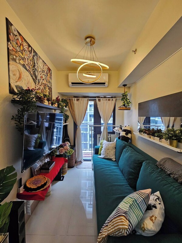 Smart TV, video games, books, stereo - The Suite Spot, Where Comfort Meets Style By FMA RESIDENCES (Pasay)