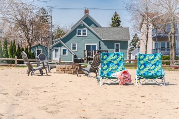 Sandy beach and fire area.