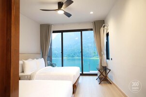 Deluxe Triple Room, Lake View | In-room safe, blackout drapes, free WiFi, bed sheets
