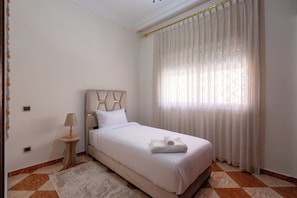 2 bedrooms, in-room safe, iron/ironing board, travel cot
