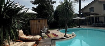 2 rooms on garden level with direct access to garden, swimming pool and barbecue