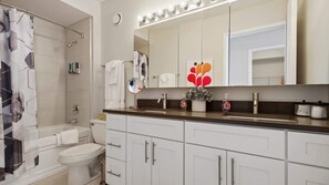 Shower, hair dryer, towels