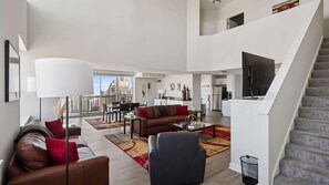 TV, fireplace, offices - Two-Story Penthouse, City Views, Pool, Gym (Chicago)