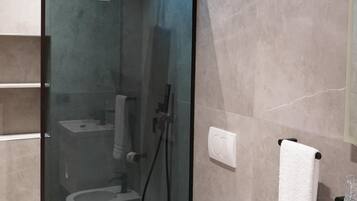 Shower, free toiletries, hair dryer, bathrobes