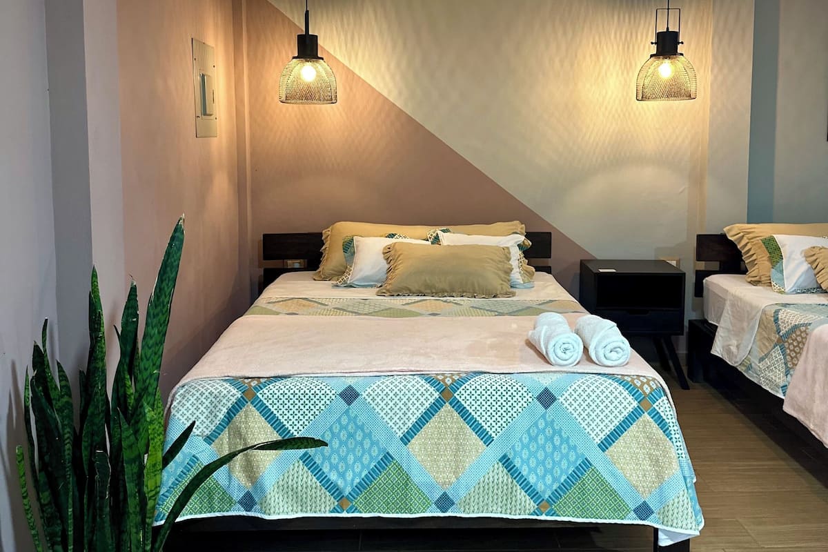 Standard Quadruple Room, Private Bathroom, Ground Floor | Down comforters, iron/ironing board, free WiFi, bed sheets