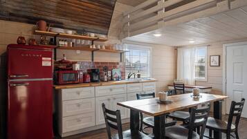 Fridge, microwave, stovetop, coffee/tea maker