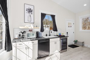 Dishwasher, coffee/tea maker, toaster, cookware/dishes/utensils