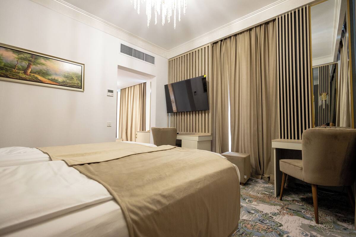 Minibar, desk, blackout drapes, soundproofing