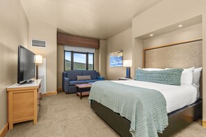 Tabla de planchar con plancha, wifi y ropa de cama