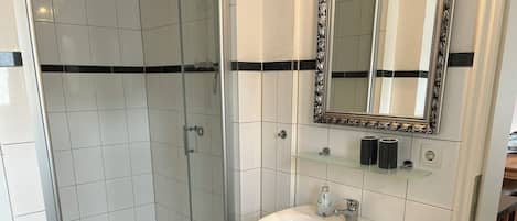 Hair dryer, towels, soap, toilet paper