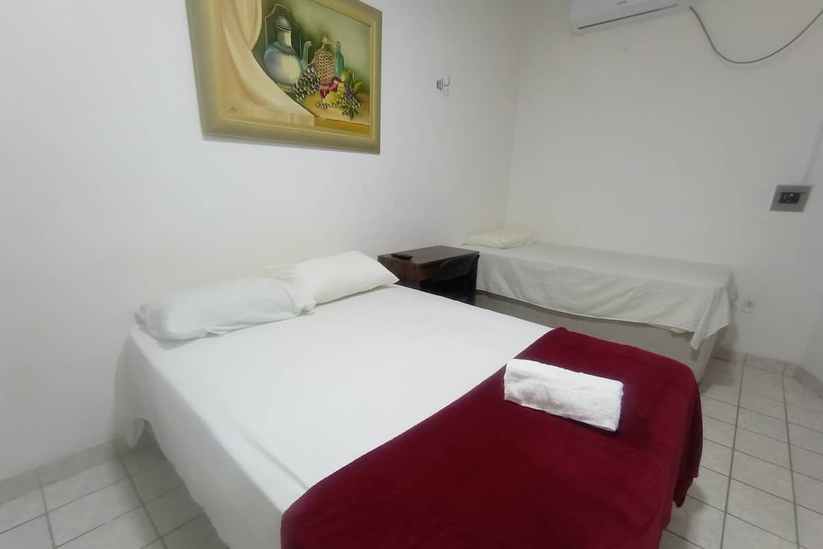 Junior Double Room, Multiple Beds, Air conditioning | 1 bedroom, minibar, desk, laptop workspace