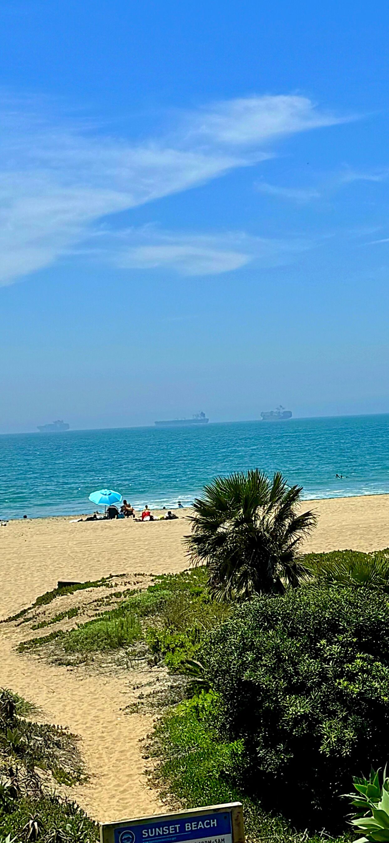 On the beach, sun-loungers, beach towels